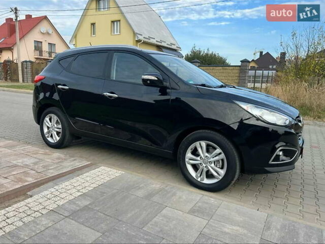 Черный Хендай их35, объемом двигателя 2 л и пробегом 202 тыс. км за 15700 $, фото 15 на Automoto.ua