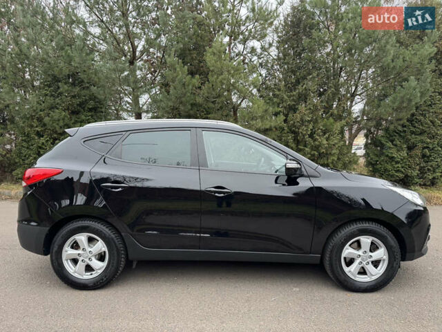Чорний Хендай іх35, об'ємом двигуна 2 л та пробігом 177 тис. км за 14650 $, фото 17 на Automoto.ua