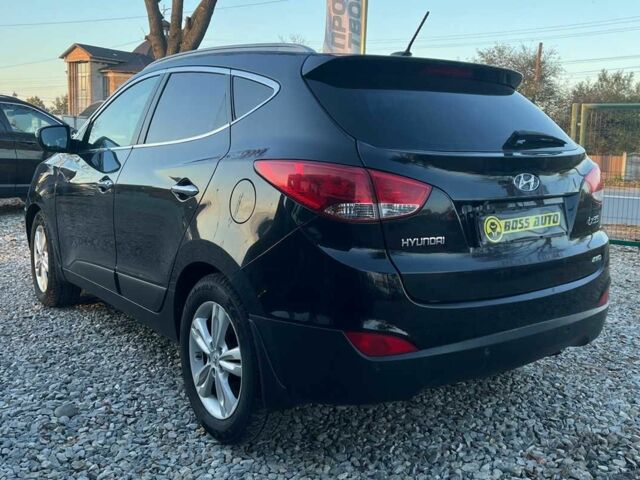 Чорний Хендай іх35, об'ємом двигуна 2 л та пробігом 178 тис. км за 13700 $, фото 6 на Automoto.ua