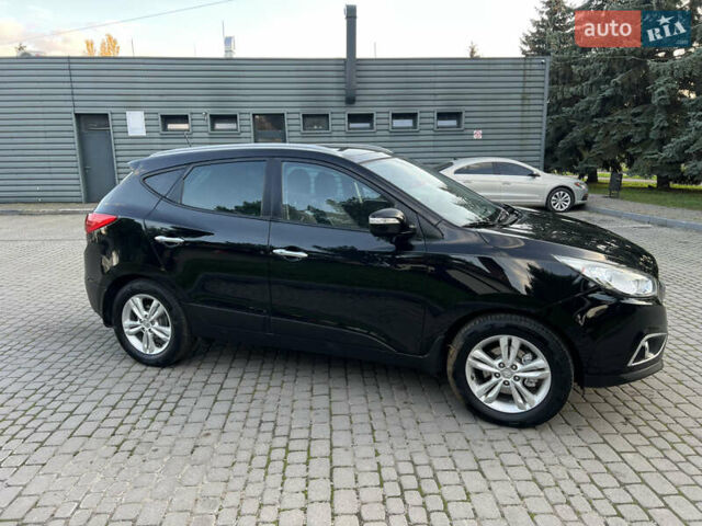 Черный Хендай их35, объемом двигателя 2 л и пробегом 175 тыс. км за 13900 $, фото 15 на Automoto.ua