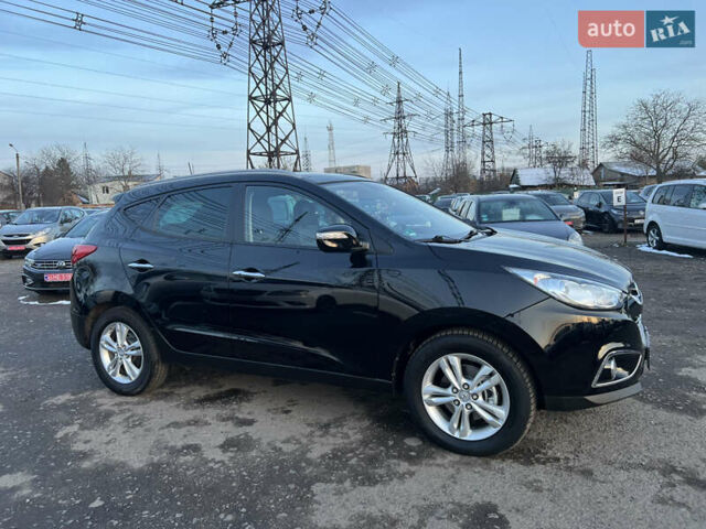 Черный Хендай их35, объемом двигателя 2 л и пробегом 213 тыс. км за 16500 $, фото 2 на Automoto.ua