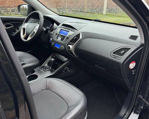 Чорний Хендай іх35, об'ємом двигуна 2 л та пробігом 177 тис. км за 14650 $, фото 51 на Automoto.ua