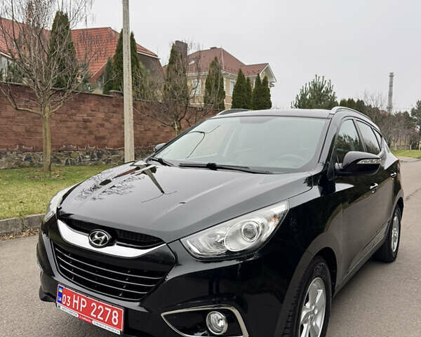 Чорний Хендай іх35, об'ємом двигуна 2 л та пробігом 177 тис. км за 14650 $, фото 5 на Automoto.ua