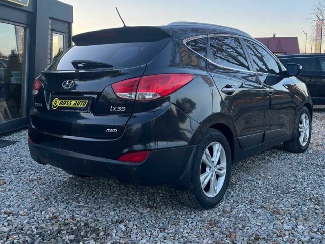 Чорний Хендай іх35, об'ємом двигуна 2 л та пробігом 178 тис. км за 13700 $, фото 4 на Automoto.ua