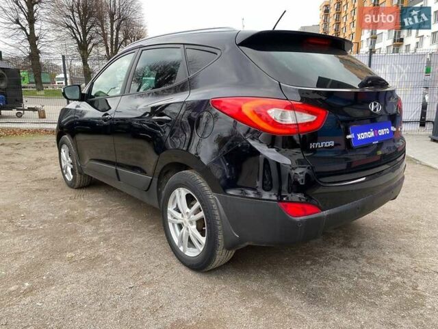 Черный Хендай их35, объемом двигателя 1.69 л и пробегом 194 тыс. км за 12500 $, фото 6 на Automoto.ua