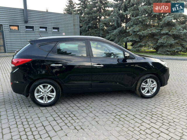 Черный Хендай их35, объемом двигателя 2 л и пробегом 175 тыс. км за 13900 $, фото 14 на Automoto.ua