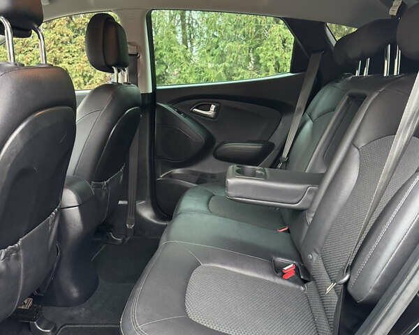 Чорний Хендай іх35, об'ємом двигуна 2 л та пробігом 177 тис. км за 14650 $, фото 55 на Automoto.ua