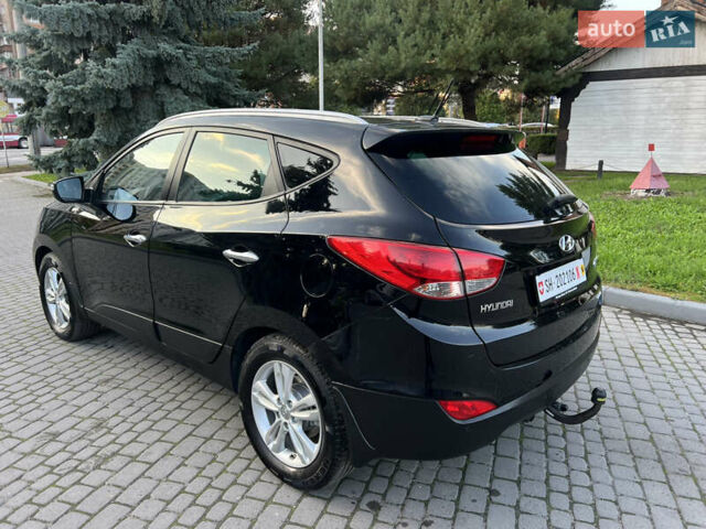 Черный Хендай их35, объемом двигателя 2 л и пробегом 175 тыс. км за 13900 $, фото 7 на Automoto.ua