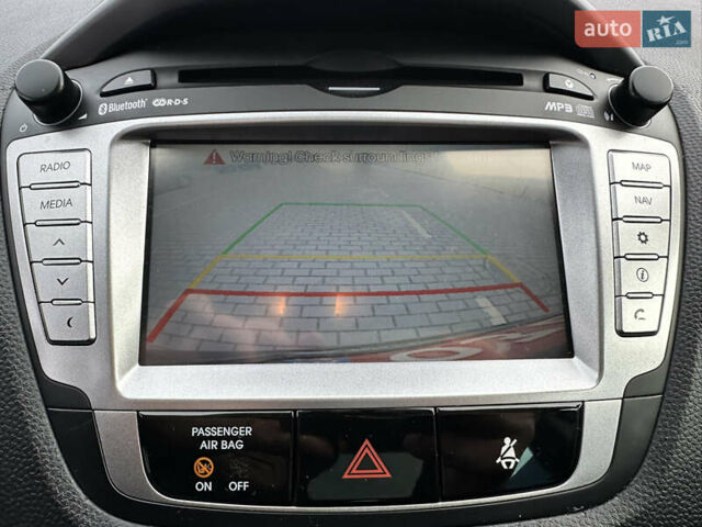 Чорний Хендай іх35, об'ємом двигуна 2 л та пробігом 148 тис. км за 14599 $, фото 31 на Automoto.ua