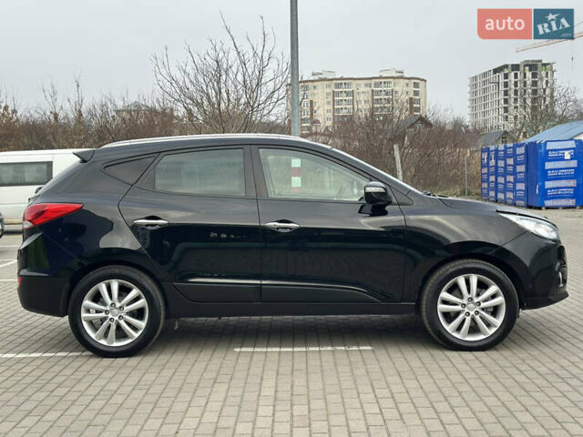 Чорний Хендай іх35, об'ємом двигуна 2 л та пробігом 148 тис. км за 14599 $, фото 3 на Automoto.ua
