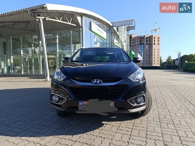 Чорний Хендай іх35, об'ємом двигуна 2 л та пробігом 237 тис. км за 12950 $, фото 25 на Automoto.ua