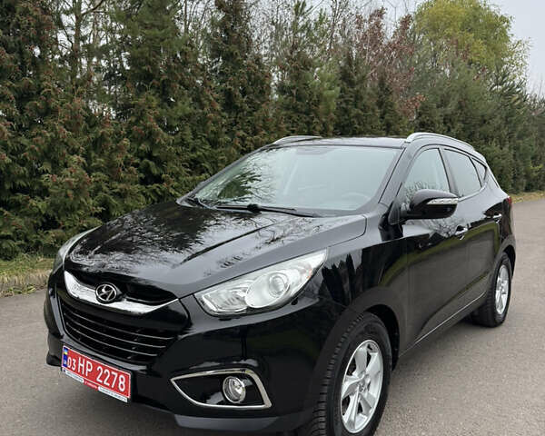 Чорний Хендай іх35, об'ємом двигуна 2 л та пробігом 177 тис. км за 14650 $, фото 6 на Automoto.ua