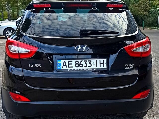 Чорний Хендай іх35, об'ємом двигуна 2 л та пробігом 167 тис. км за 13800 $, фото 5 на Automoto.ua