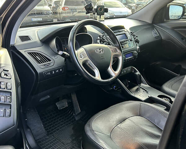Чорний Хендай іх35, об'ємом двигуна 2 л та пробігом 241 тис. км за 14400 $, фото 6 на Automoto.ua