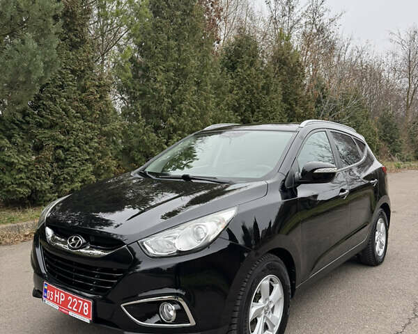 Чорний Хендай іх35, об'ємом двигуна 2 л та пробігом 177 тис. км за 14650 $, фото 10 на Automoto.ua