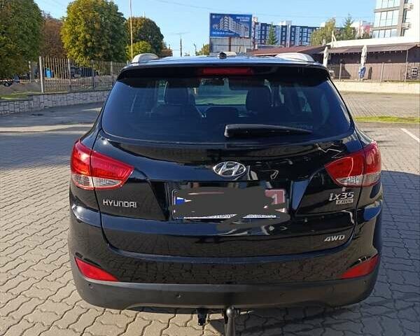 Чорний Хендай іх35, об'ємом двигуна 2 л та пробігом 237 тис. км за 12950 $, фото 20 на Automoto.ua