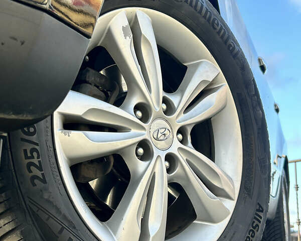 Чорний Хендай іх35, об'ємом двигуна 2 л та пробігом 241 тис. км за 14400 $, фото 3 на Automoto.ua