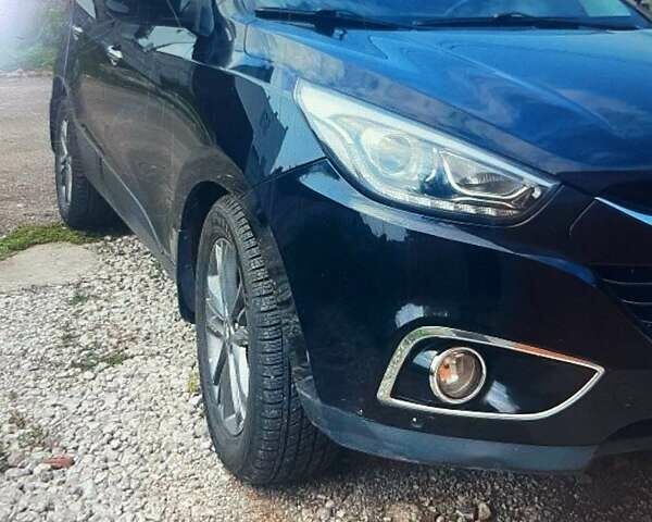 Черный Хендай их35, объемом двигателя 2 л и пробегом 185 тыс. км за 14399 $, фото 9 на Automoto.ua