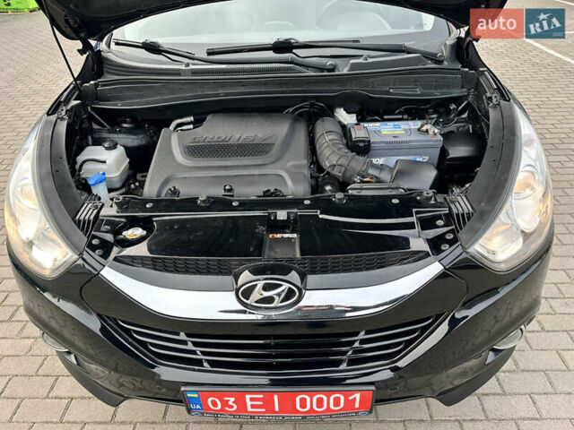 Чорний Хендай іх35, об'ємом двигуна 2 л та пробігом 148 тис. км за 14599 $, фото 54 на Automoto.ua