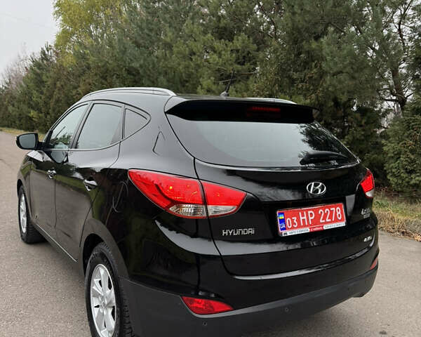 Чорний Хендай іх35, об'ємом двигуна 2 л та пробігом 177 тис. км за 14650 $, фото 21 на Automoto.ua