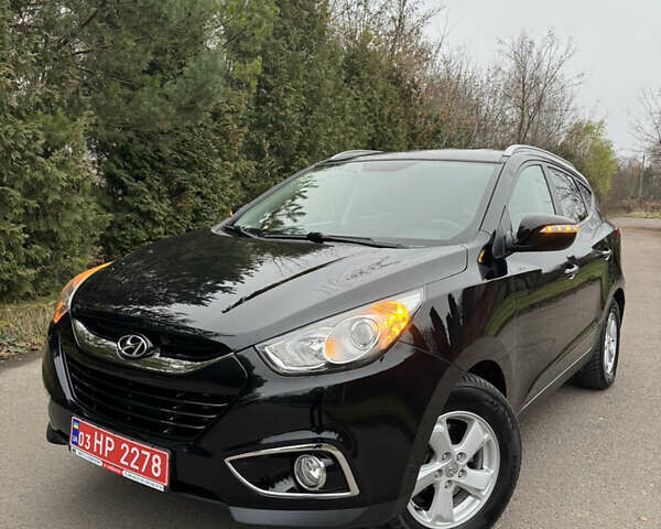 Чорний Хендай іх35, об'ємом двигуна 2 л та пробігом 177 тис. км за 14650 $, фото 14 на Automoto.ua