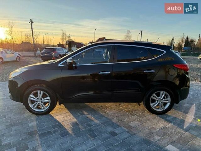 Черный Хендай их35, объемом двигателя 2 л и пробегом 178 тыс. км за 12699 $, фото 5 на Automoto.ua