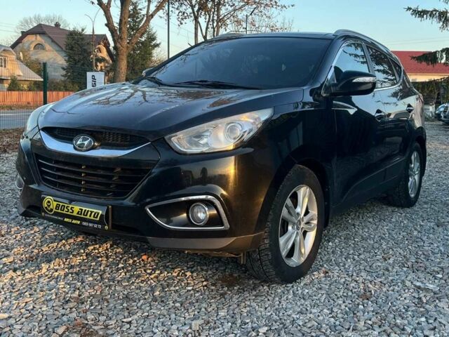 Чорний Хендай іх35, об'ємом двигуна 2 л та пробігом 178 тис. км за 13700 $, фото 3 на Automoto.ua