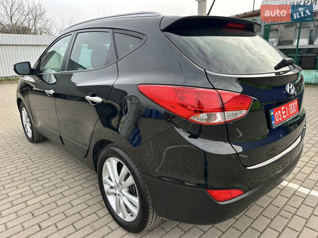 Чорний Хендай іх35, об'ємом двигуна 2 л та пробігом 148 тис. км за 14599 $, фото 17 на Automoto.ua