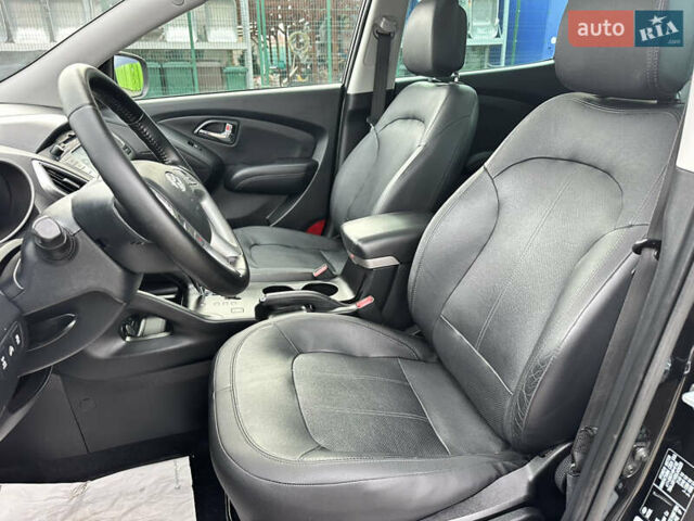 Чорний Хендай іх35, об'ємом двигуна 2 л та пробігом 148 тис. км за 14599 $, фото 25 на Automoto.ua