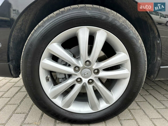 Чорний Хендай іх35, об'ємом двигуна 2 л та пробігом 148 тис. км за 14599 $, фото 11 на Automoto.ua