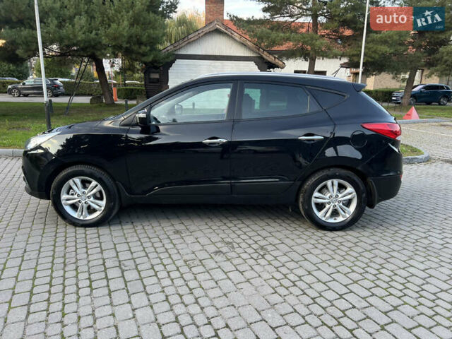 Черный Хендай их35, объемом двигателя 2 л и пробегом 175 тыс. км за 13900 $, фото 4 на Automoto.ua