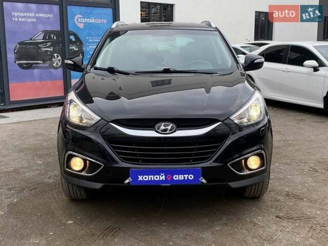 Черный Хендай их35, объемом двигателя 1.69 л и пробегом 194 тыс. км за 12500 $, фото 1 на Automoto.ua