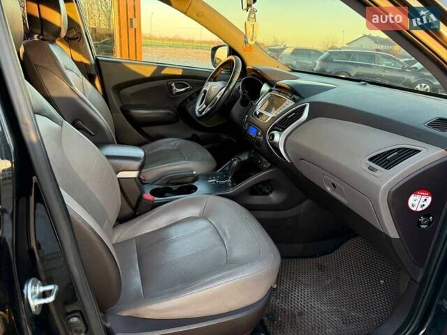 Черный Хендай их35, объемом двигателя 2 л и пробегом 178 тыс. км за 12699 $, фото 22 на Automoto.ua