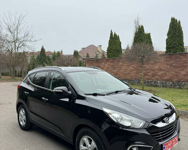 Чорний Хендай іх35, об'ємом двигуна 2 л та пробігом 177 тис. км за 14650 $, фото 9 на Automoto.ua
