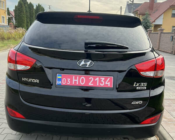 Черный Хендай их35, объемом двигателя 2 л и пробегом 202 тыс. км за 15700 $, фото 4 на Automoto.ua