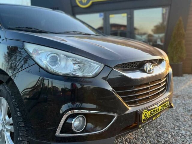 Чорний Хендай іх35, об'ємом двигуна 2 л та пробігом 178 тис. км за 13700 $, фото 1 на Automoto.ua