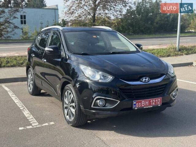 Черный Хендай их35, объемом двигателя 2 л и пробегом 162 тыс. км за 14200 $, фото 1 на Automoto.ua