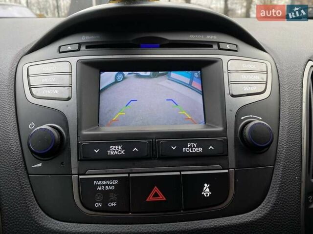 Черный Хендай их35, объемом двигателя 1.69 л и пробегом 194 тыс. км за 12500 $, фото 13 на Automoto.ua