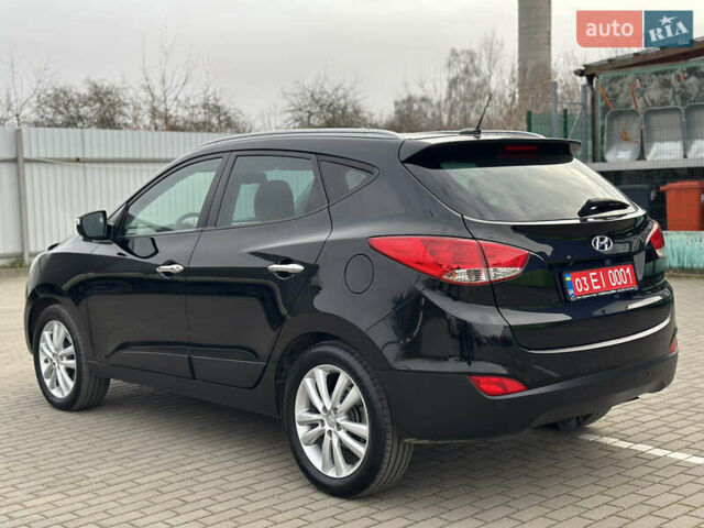 Чорний Хендай іх35, об'ємом двигуна 2 л та пробігом 148 тис. км за 14599 $, фото 6 на Automoto.ua