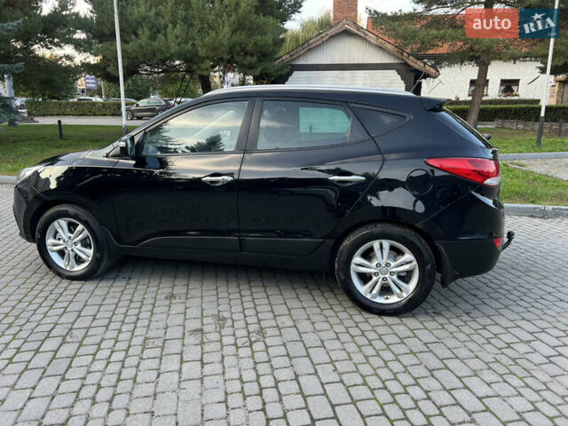 Черный Хендай их35, объемом двигателя 2 л и пробегом 175 тыс. км за 13900 $, фото 5 на Automoto.ua