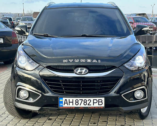 Чорний Хендай іх35, об'ємом двигуна 2 л та пробігом 241 тис. км за 14400 $, фото 2 на Automoto.ua