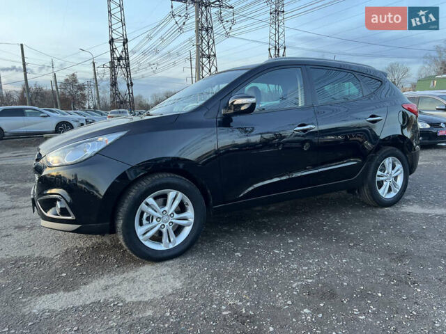 Черный Хендай их35, объемом двигателя 2 л и пробегом 213 тыс. км за 16500 $, фото 4 на Automoto.ua