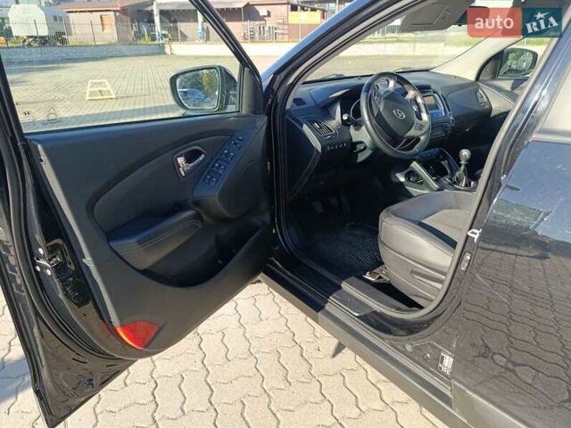 Чорний Хендай іх35, об'ємом двигуна 2 л та пробігом 237 тис. км за 12950 $, фото 14 на Automoto.ua