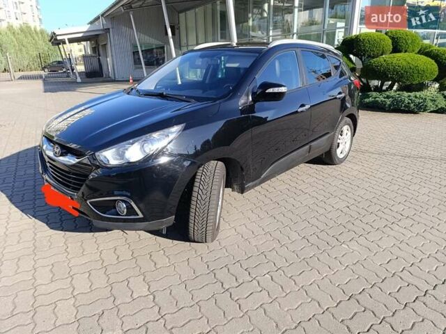 Чорний Хендай іх35, об'ємом двигуна 2 л та пробігом 237 тис. км за 12950 $, фото 24 на Automoto.ua