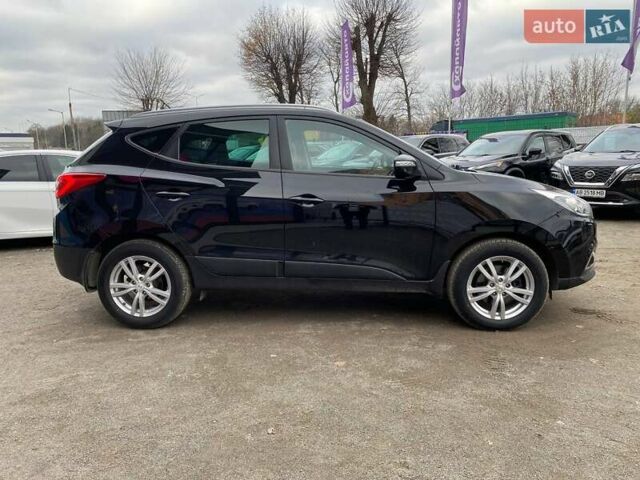 Черный Хендай их35, объемом двигателя 1.69 л и пробегом 194 тыс. км за 12500 $, фото 3 на Automoto.ua