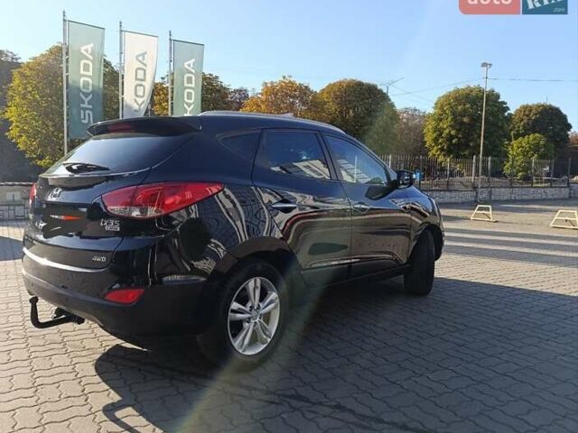 Чорний Хендай іх35, об'ємом двигуна 2 л та пробігом 237 тис. км за 12950 $, фото 23 на Automoto.ua