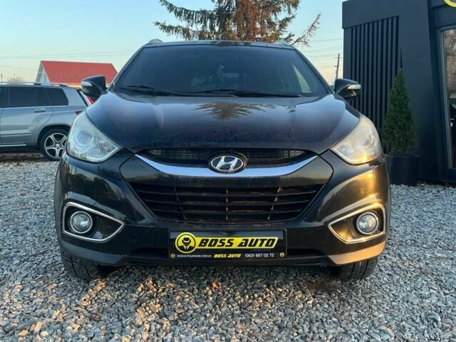 Чорний Хендай іх35, об'ємом двигуна 2 л та пробігом 178 тис. км за 13700 $, фото 2 на Automoto.ua