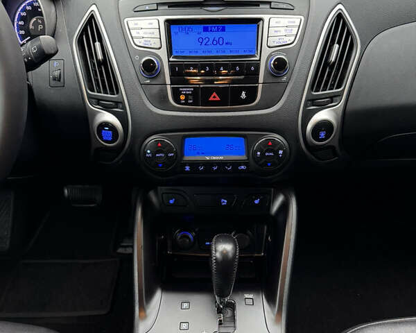 Чорний Хендай іх35, об'ємом двигуна 2 л та пробігом 177 тис. км за 14650 $, фото 48 на Automoto.ua