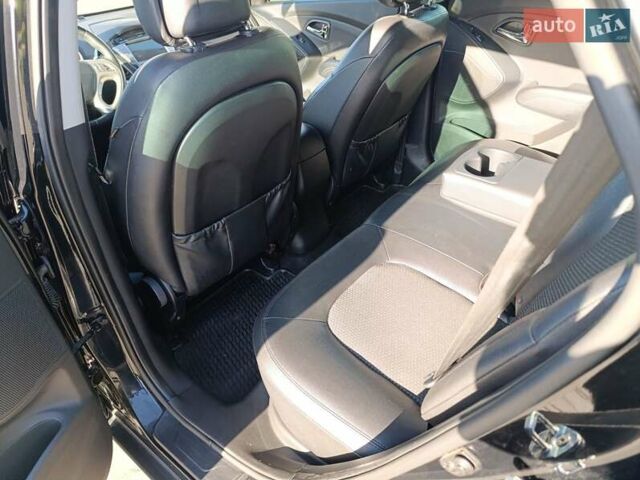Чорний Хендай іх35, об'ємом двигуна 2 л та пробігом 237 тис. км за 12950 $, фото 26 на Automoto.ua