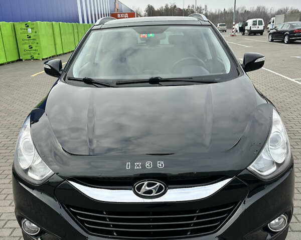 Чорний Хендай іх35, об'ємом двигуна 2 л та пробігом 148 тис. км за 14599 $, фото 14 на Automoto.ua